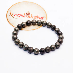 Pyrite bracelet on a white background with 'Rudraksha' branding.