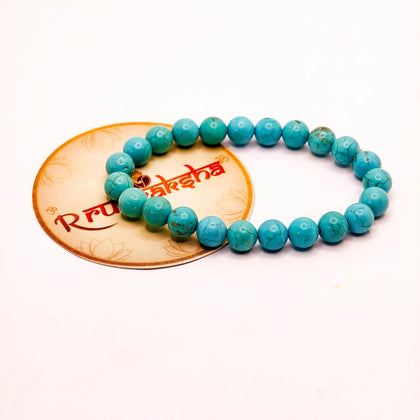 Lab Tested Firoza Turquoise beaded bracelet on a white background