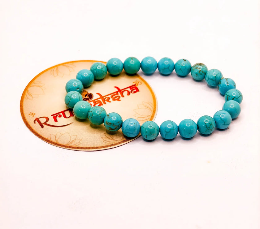 Lab Tested Firoza Turquoise beaded bracelet on a white background