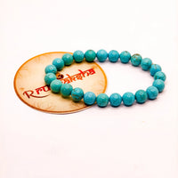 Lab Tested Firoza Turquoise beaded bracelet on a white background
