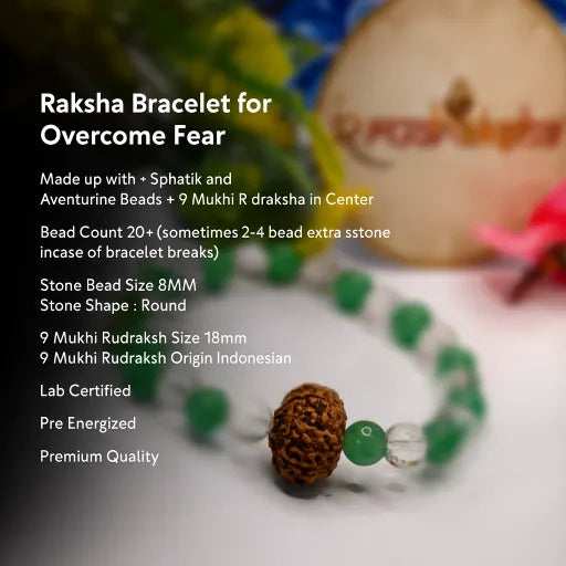 Raksha Bracelet with aventurine beads and sphatik beads and a central brown indonesian 9 Mukhi rudraksha bead on a blurred background