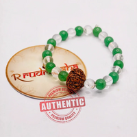 Green Aventurine and sphatik quartz with 9 Mukhi Rudraksha, Green and silver beaded bracelet with a brown Rudraksha bead on a white background with 'Rudraksha' branding.
