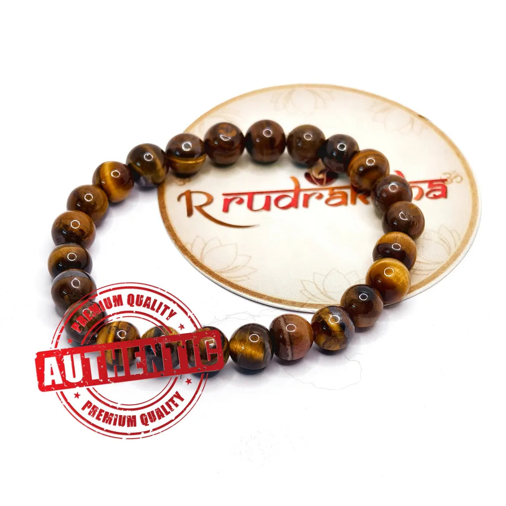 Tiger Eye Beaded bracelet on a R Rudraksha branded card with 'Authentic' stamp