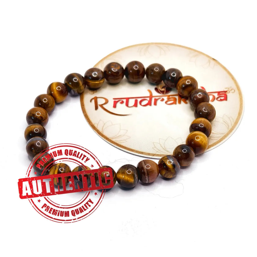 Tiger Eye Beaded bracelet on a R Rudraksha branded card with 'Authentic' stamp